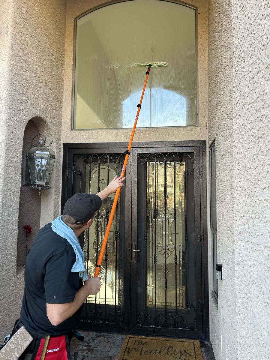 Washing windows with a pole